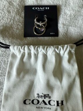 Coach Silver Stack Ring Trio with Light Pink Heart Charm